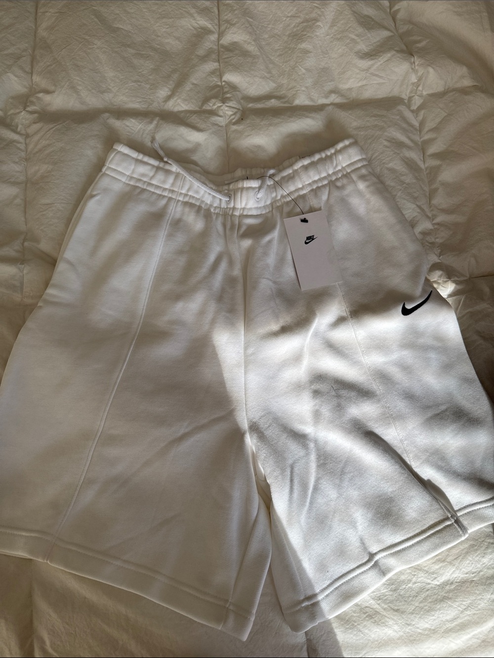 Nike Men’s White Athletic Shorts with Black Swoosh